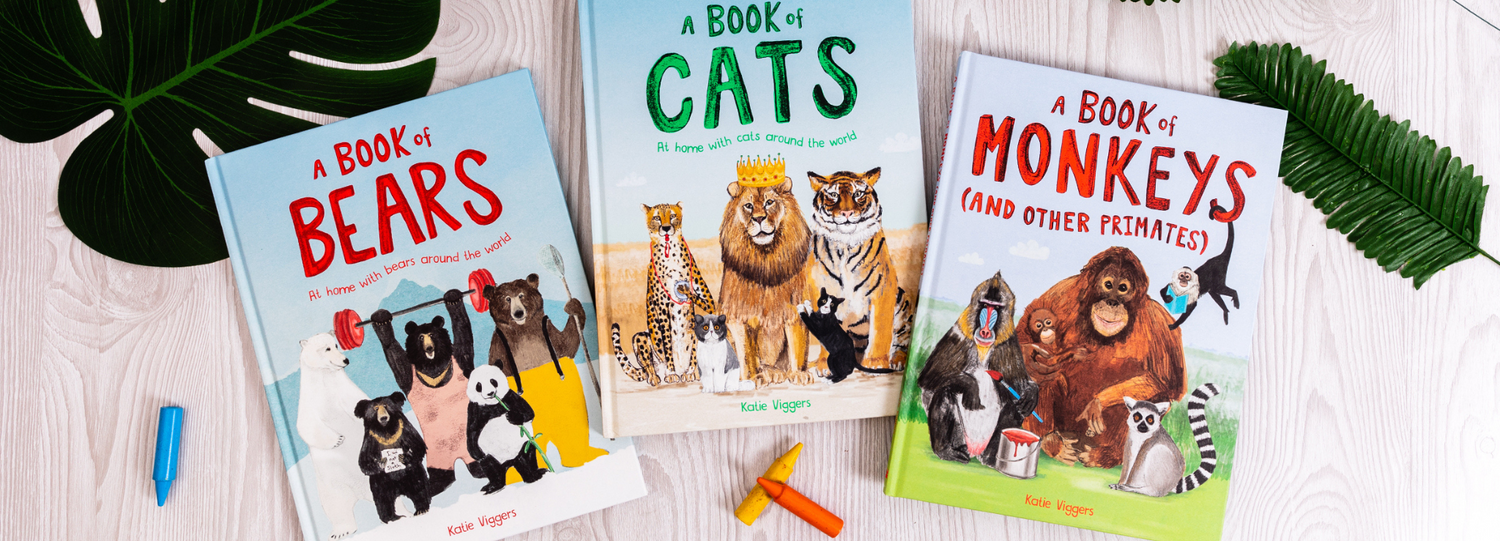 A Book of Bears, A Book of Cats and A Book of Monkeys photographed together and surrounded by leaves and crayons.