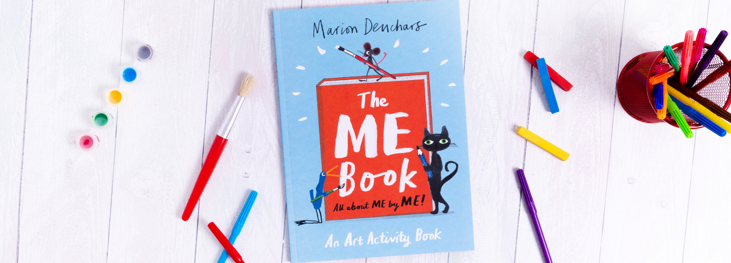 The ME Book by Marion Deuchars surrounded by art equipment